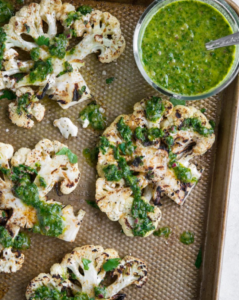 Cauliflower Steaks with Lemon Olive Oil and Parsley Pistachio Topping Recipe