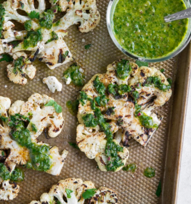 Cauliflower Steaks with Lemon Olive Oil and Parsley Pistachio Topping Recipe