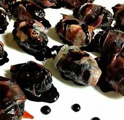 Dates Warped In Prosciutto Drizzled with  Pomegranate Balsamic Recipe