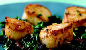 Lemon Infused Olive Oil Scallops with Sauteed Spinach Recipe
