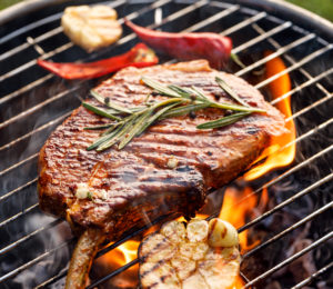 Grilled Beer-Marinated Pork Chops with Garlic Infused Oil Olive Blue Cheese Topping Recipe