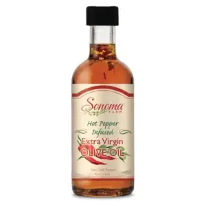 Sample size bottle of hot pepper extra virgin olive oil.