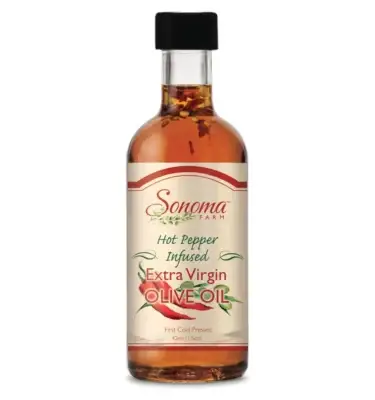 Sample size bottle of hot pepper extra virgin olive oil.