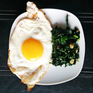 EVOO Fried Eggs with Sautéed Garlic Kale Recipe