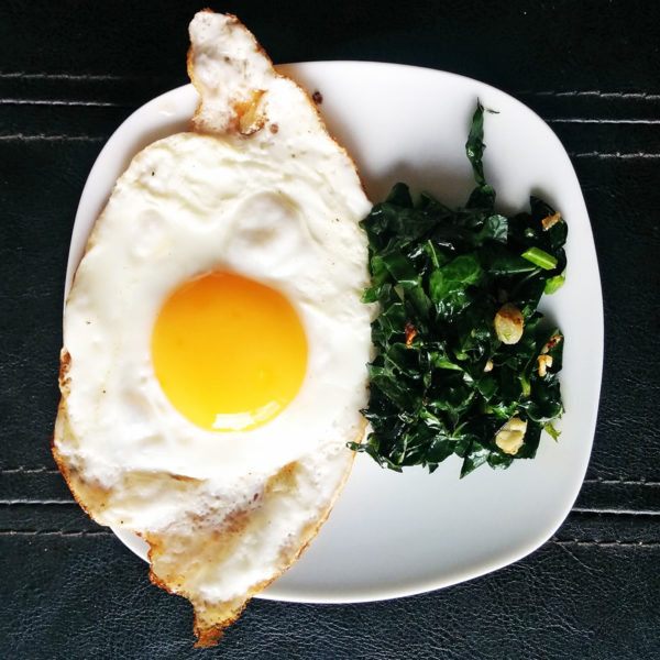EVOO Fried Eggs with Sautéed Garlic Kale Recipe