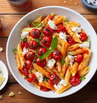 Garlic Olive Oil Rigatoni with Roasted Cherry Tomatoes and Burrata Recipe