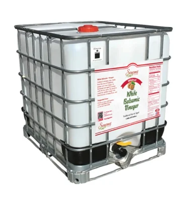 275 gallon industrial tote of Walnut Infused White Balsamic Vinegar from Sonoma Farm